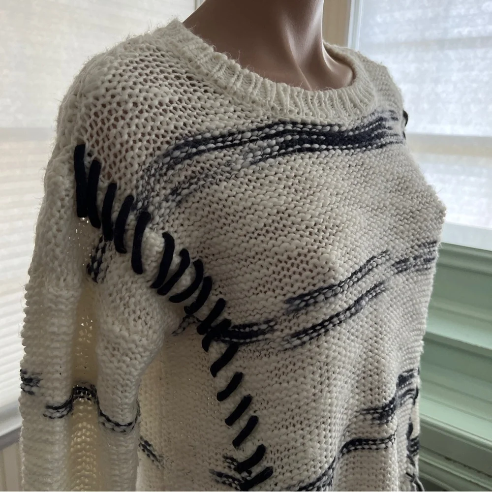 Rebecca Elliot white black fringe sweater